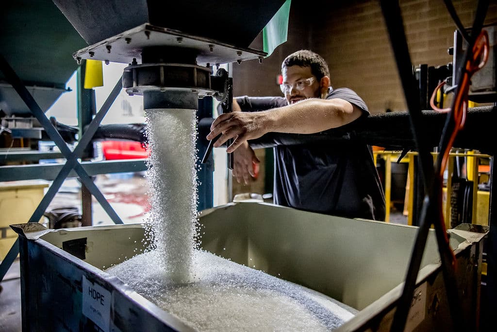 pouring plastic beads